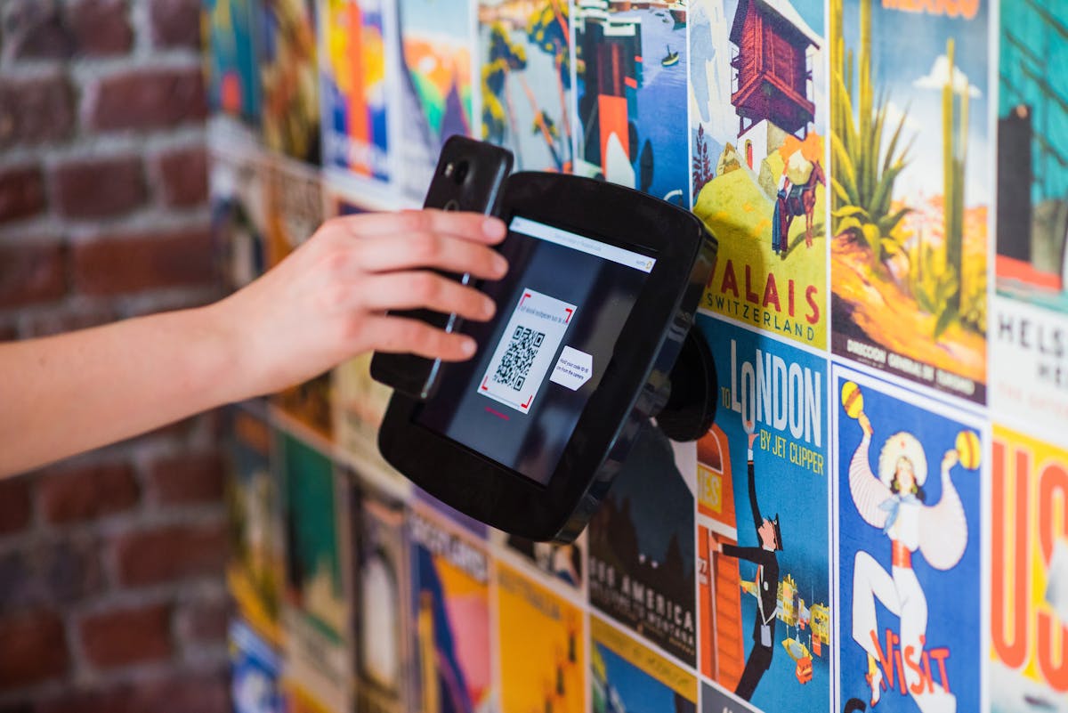 Smartphone scanning a QR code on a product label with camera interface overlay